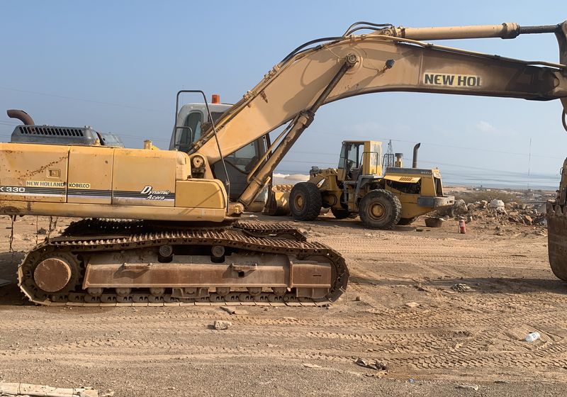 Steel track undercarriage components including sprockets and rollers for tracked machines